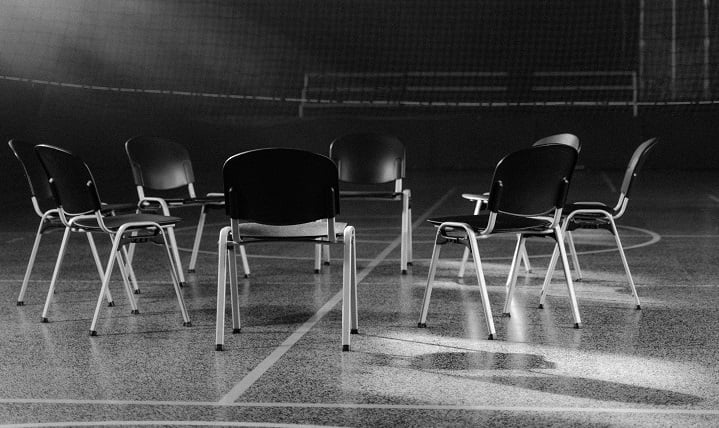 Black and white photo of chairs set up for a group therapy program at a drug and alcohol rehab in Lincoln