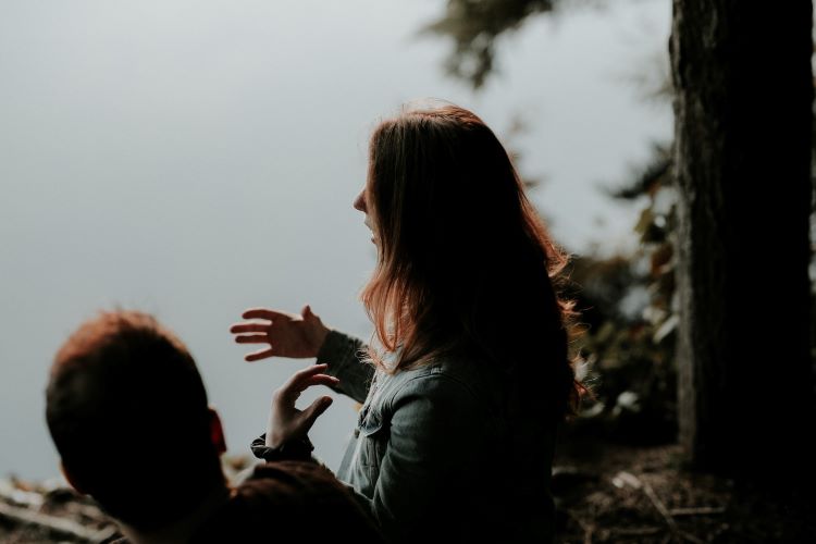 A woman chatting and gesticulating in Shropshire