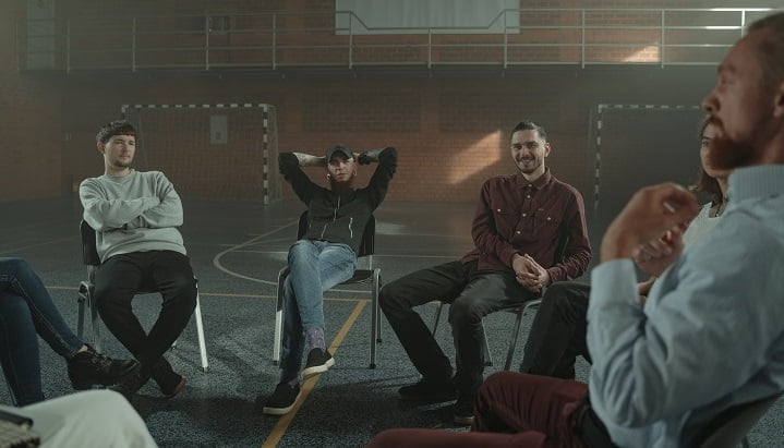 Therapy group smiling together at a drug and alcohol rehab in Gloucestershire