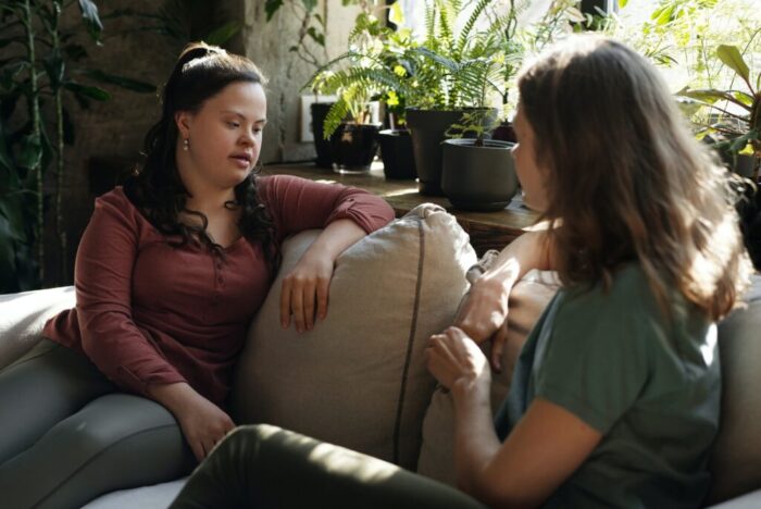 Two people sharing a conversation at a drug and alcohol rehab centre in Luton