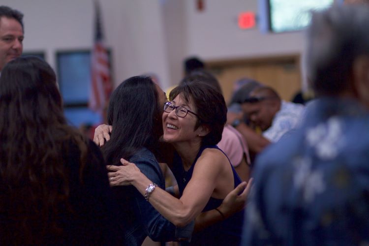 Two women hugging