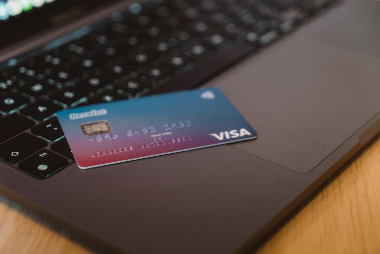 A bank card on a laptop in Manchester