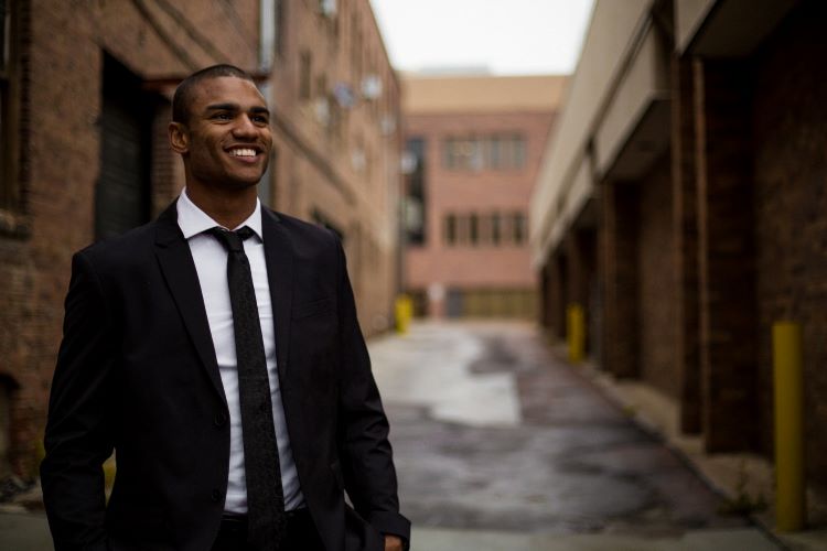 Man smiling in suit