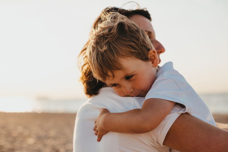 A mother and child affected by alcohol aggression