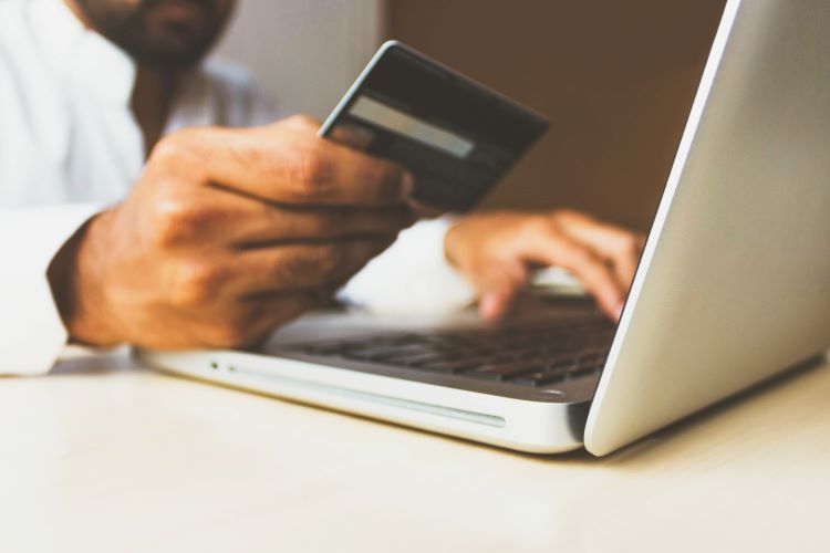 laptop and bank card