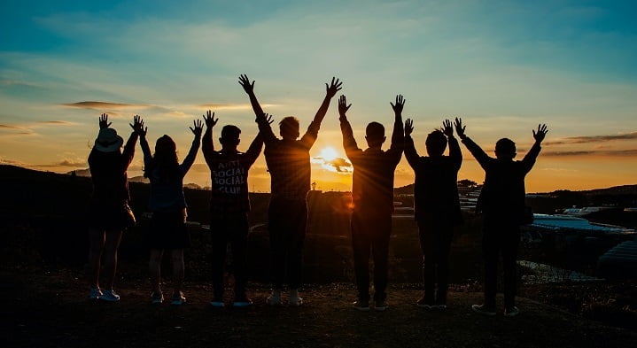 Group celebrating a sunset in Cardiff