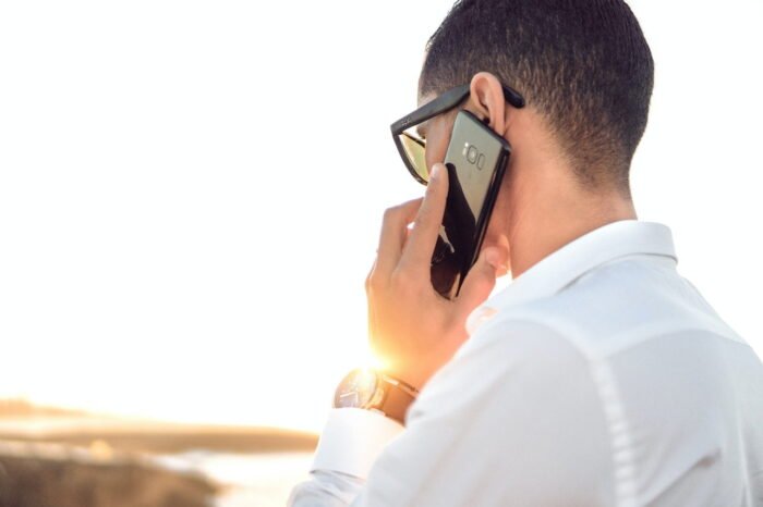 Man with phone in Stoke on Trent