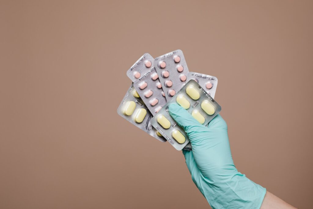Rehab worker holding drugs at a drug and alcohol rehab in Aberdeenshire