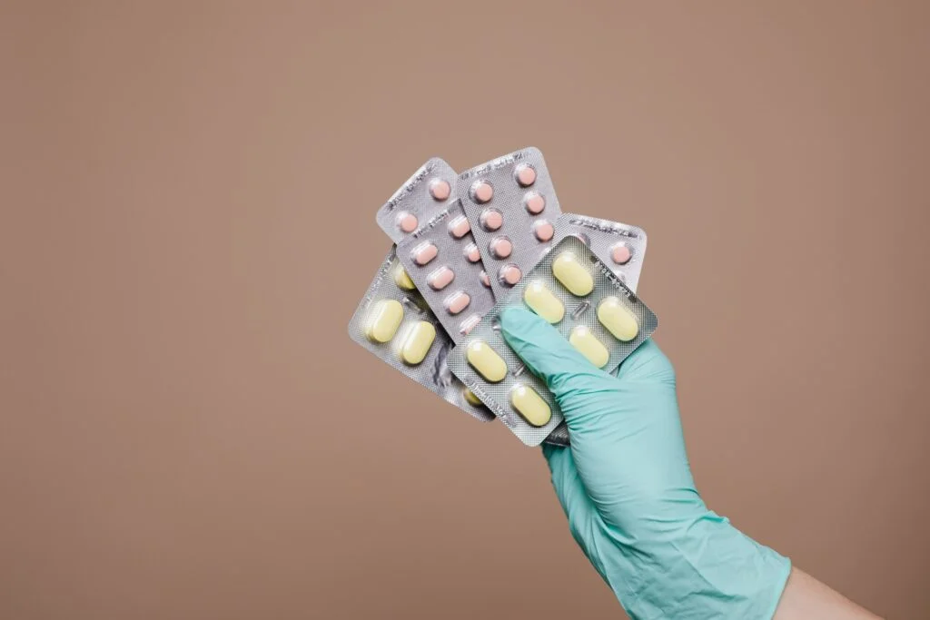 Rehab worker holding drugs at a drug and alcohol rehab in Aberdeenshire
