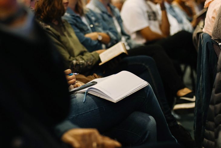 Patients sat together taking notes at a drug and alcohol rehab centre in East Sussex or near East Sussex