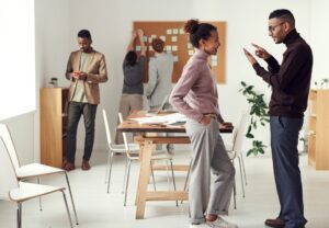 People interacting in an office setting