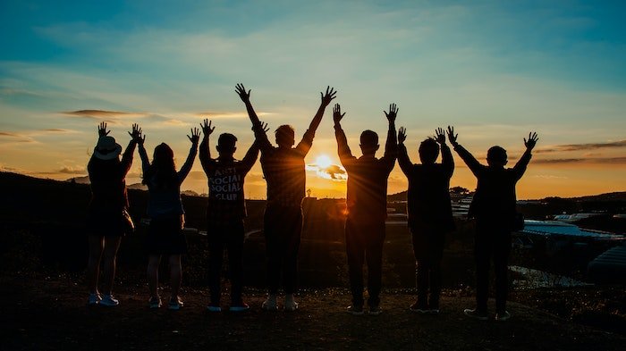 Friends in Blackburn celebrating a sunset