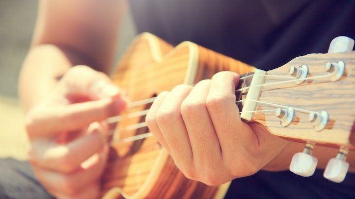 Person playing an instrument