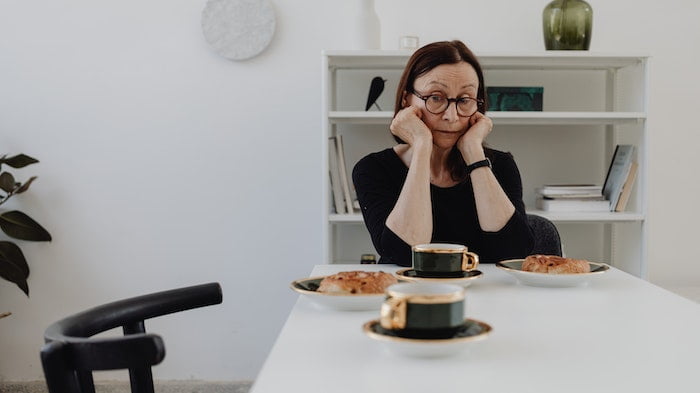 Woman sitting at a table