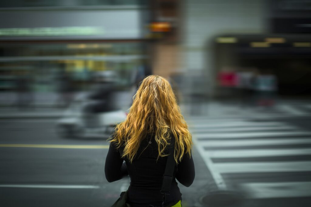 girl crossing road