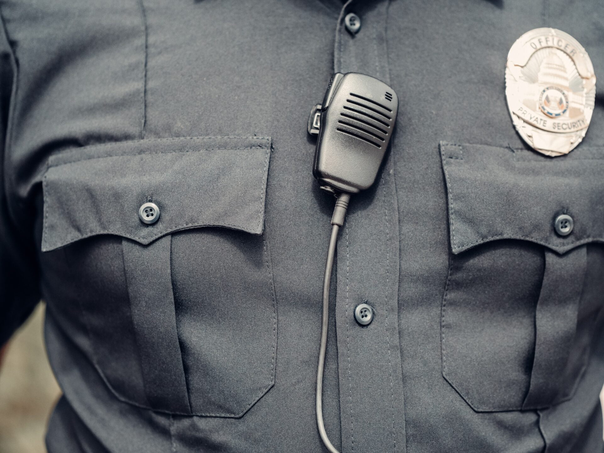 police badge and radio