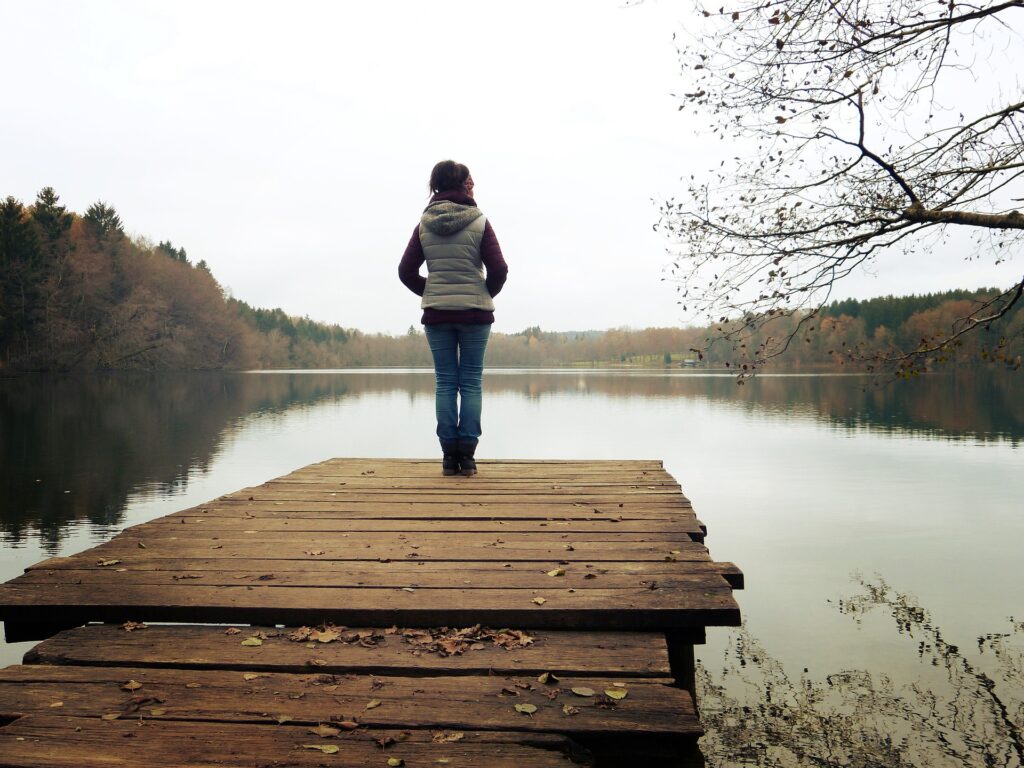 woman standing and looking out