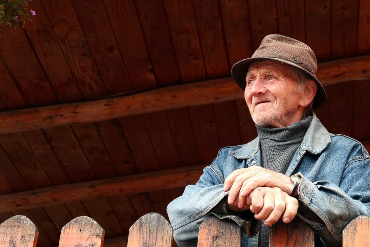 Elderly man looking into the distance at alcohol rehab Cambridgeshire