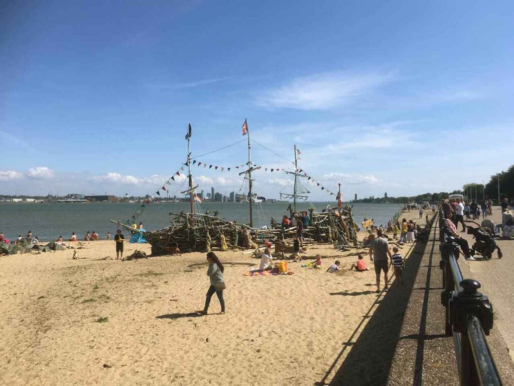 A person walking on a beach