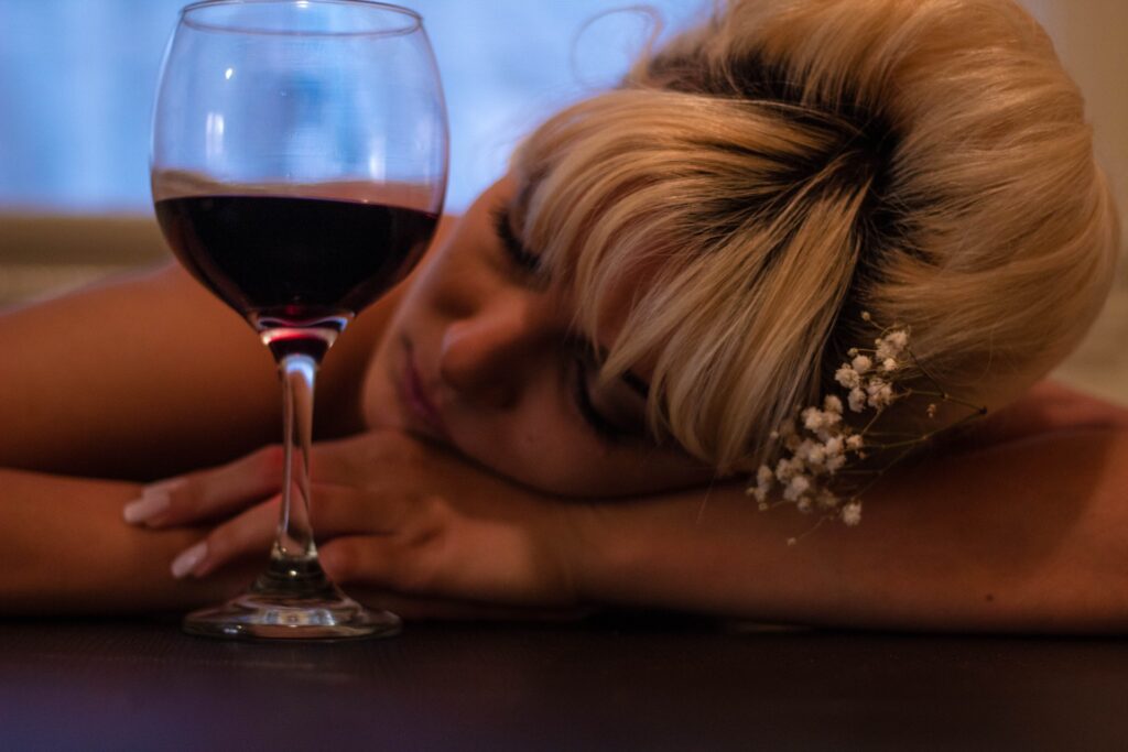 Woman with a glass of red wine in Liverpool