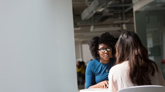 Two patients having a serious conversation