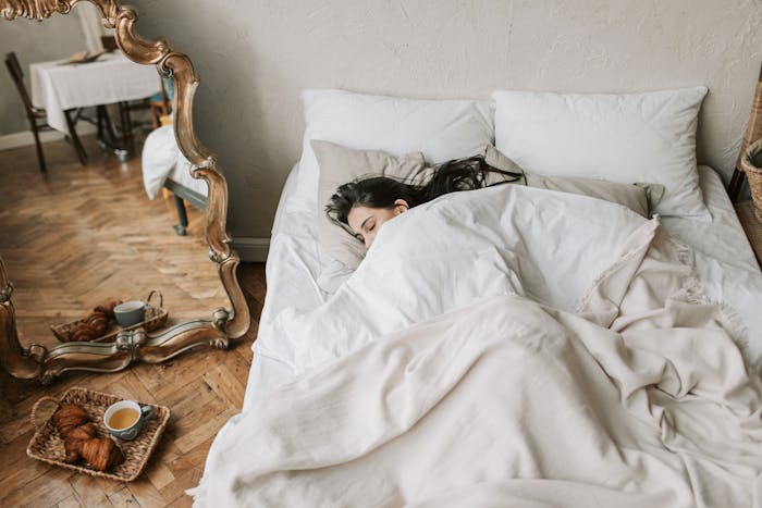 Woman detoxing at home in bed